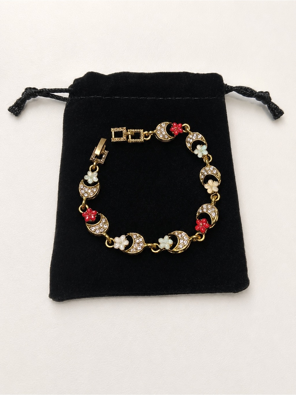 Gold Tone Floral Crescent Bracelet with Red and White Enamel Flowers